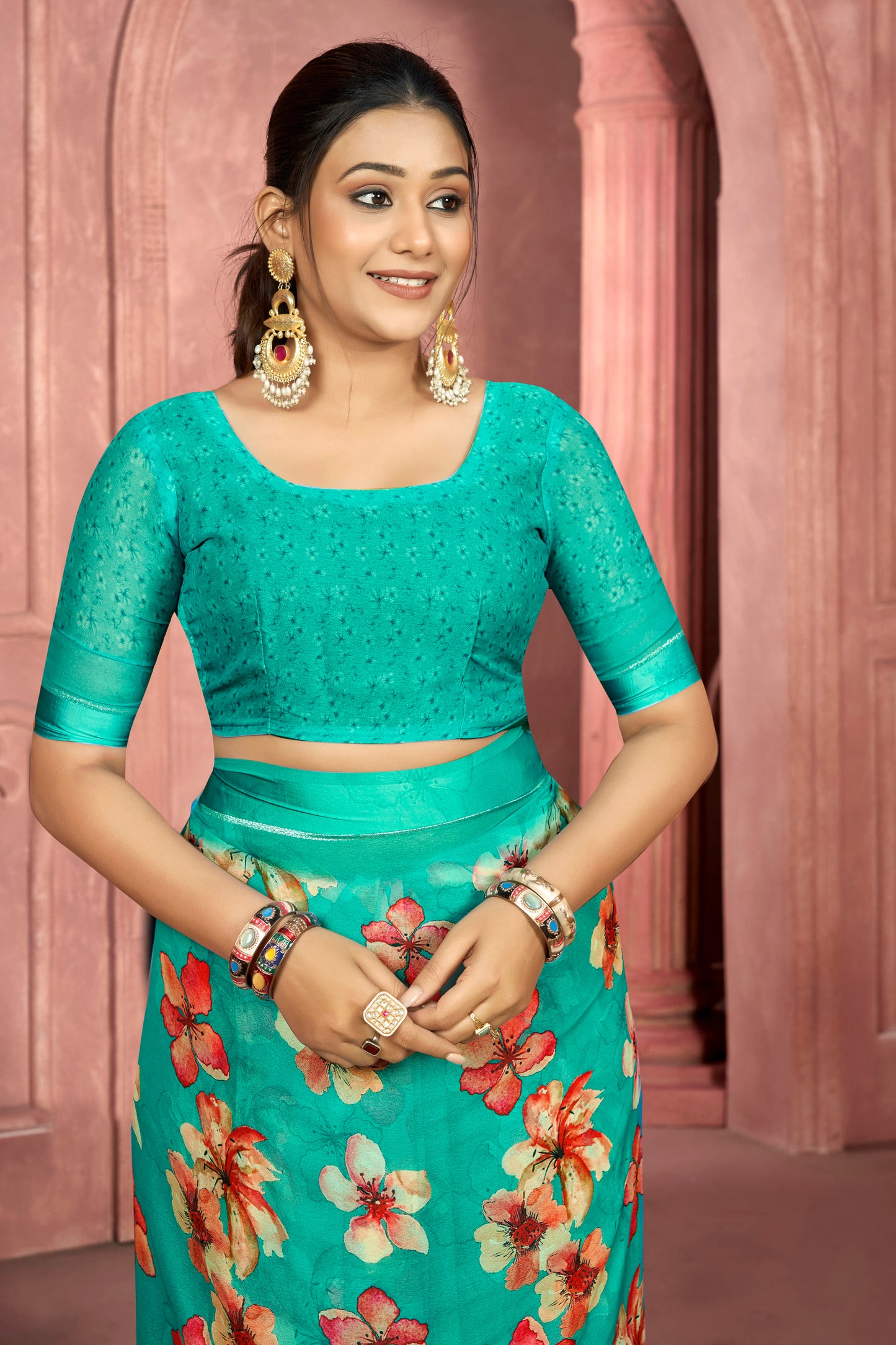 Samriddhi – Turquoise Moss Georgette Digital Print Saree with Satin Patta Border