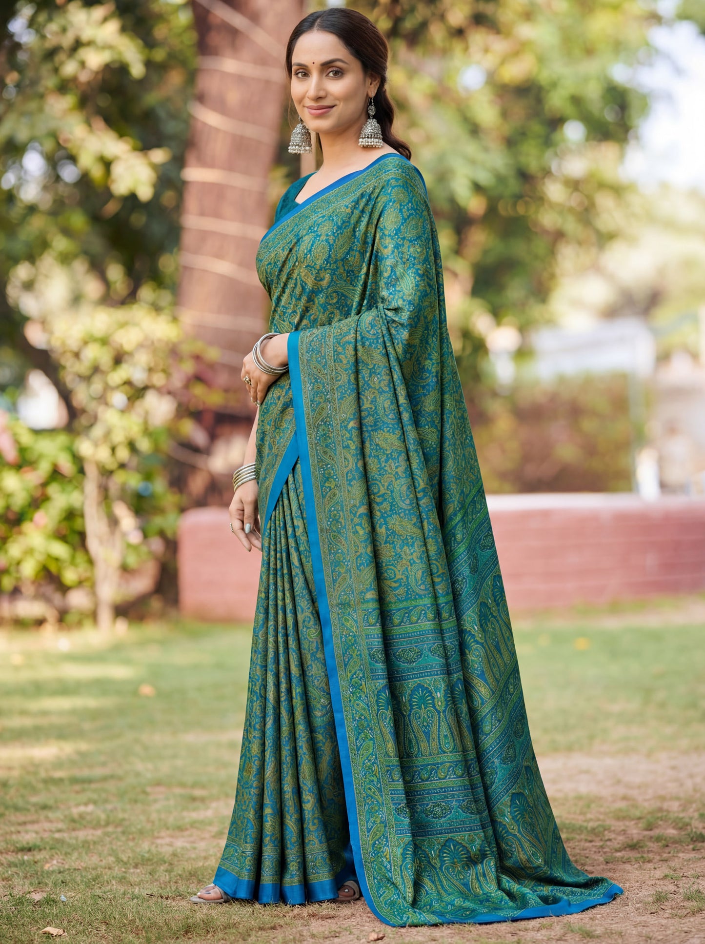 Rajkala - Teal Printed Crepe Silk Saree