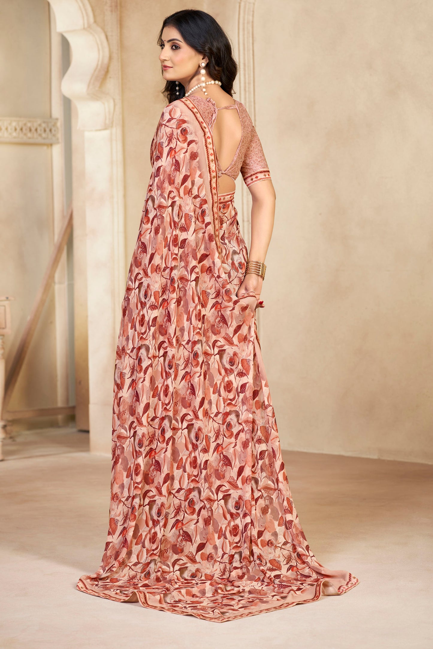 Sumedha- Peach Printed Georgette Saree