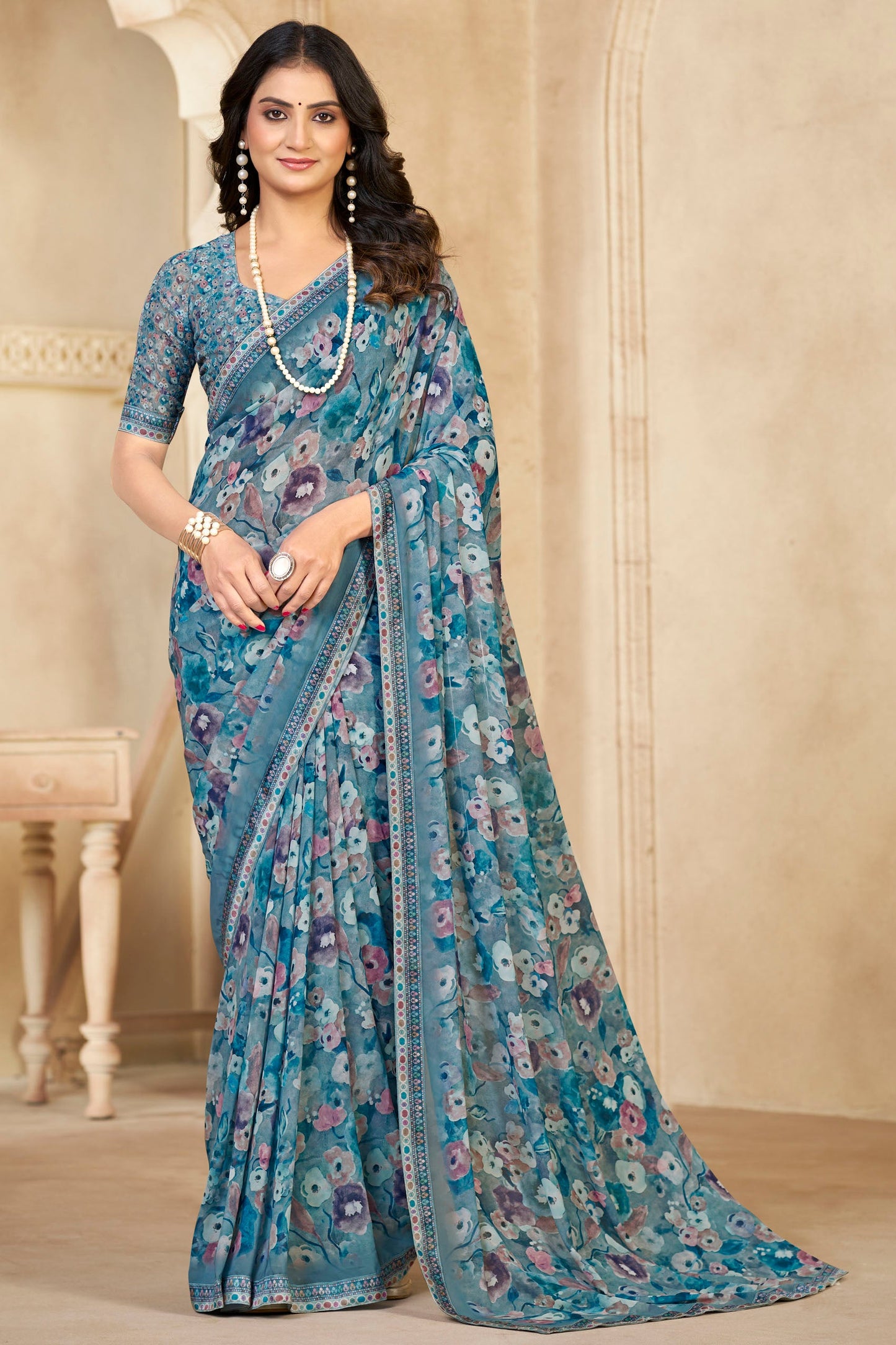 Sumedha- Aqua Blue Printed Georgette Saree