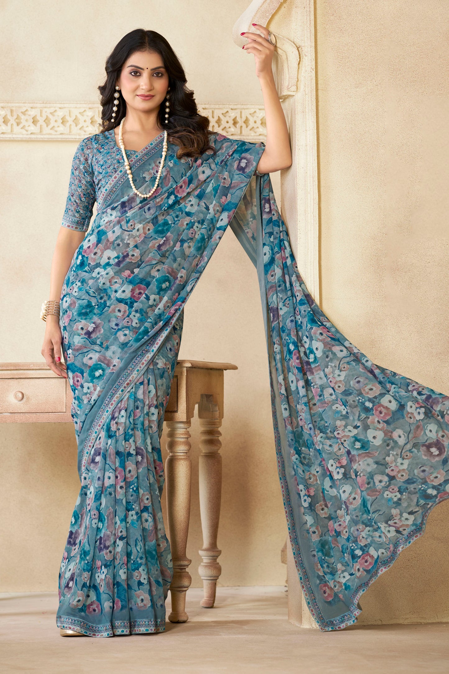 Sumedha- Aqua Blue Printed Georgette Saree