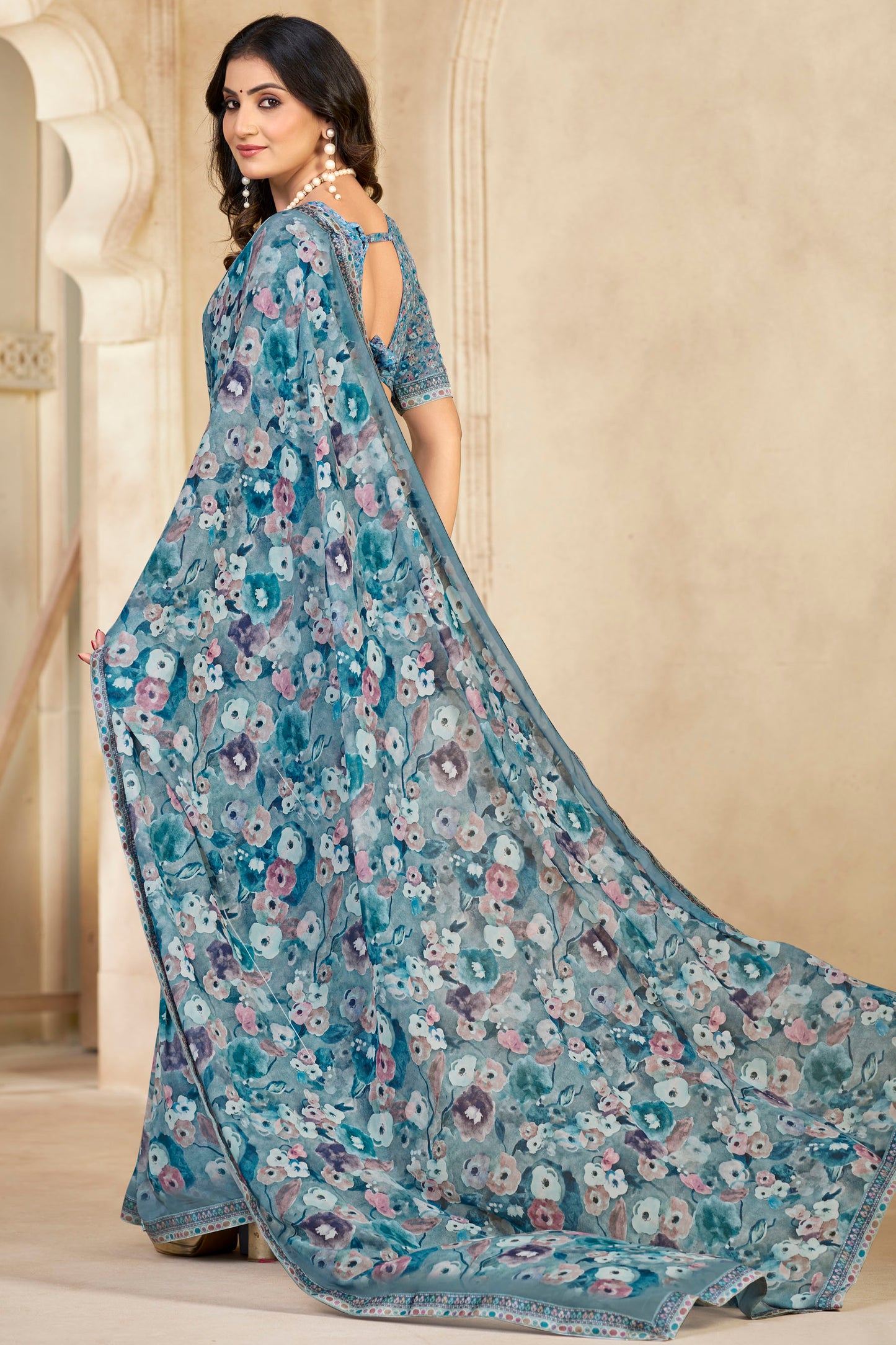 Sumedha- Aqua Blue Printed Georgette Saree