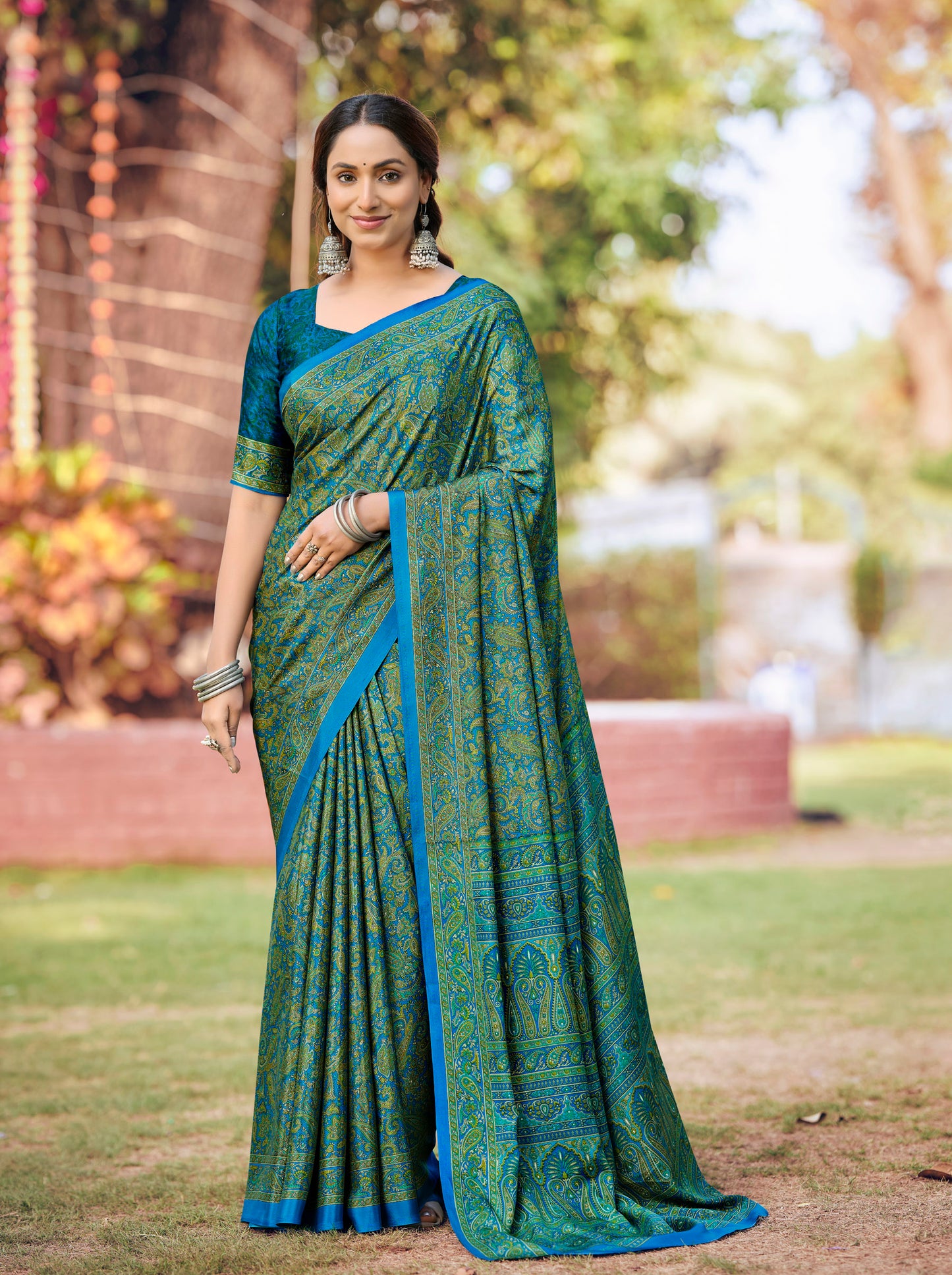 Rajkala - Teal Printed Crepe Silk Saree