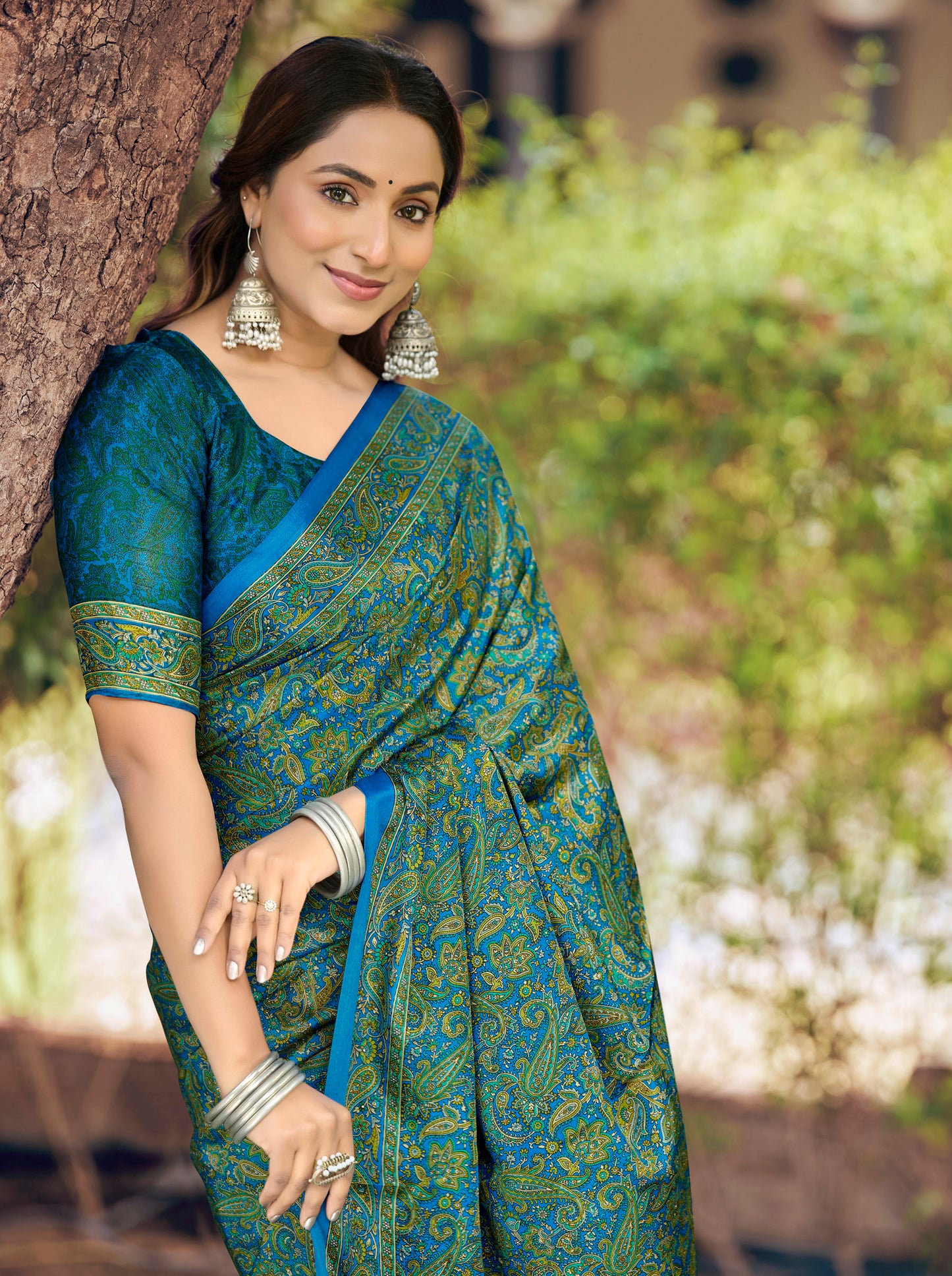 Rajkala - Teal Printed Crepe Silk Saree