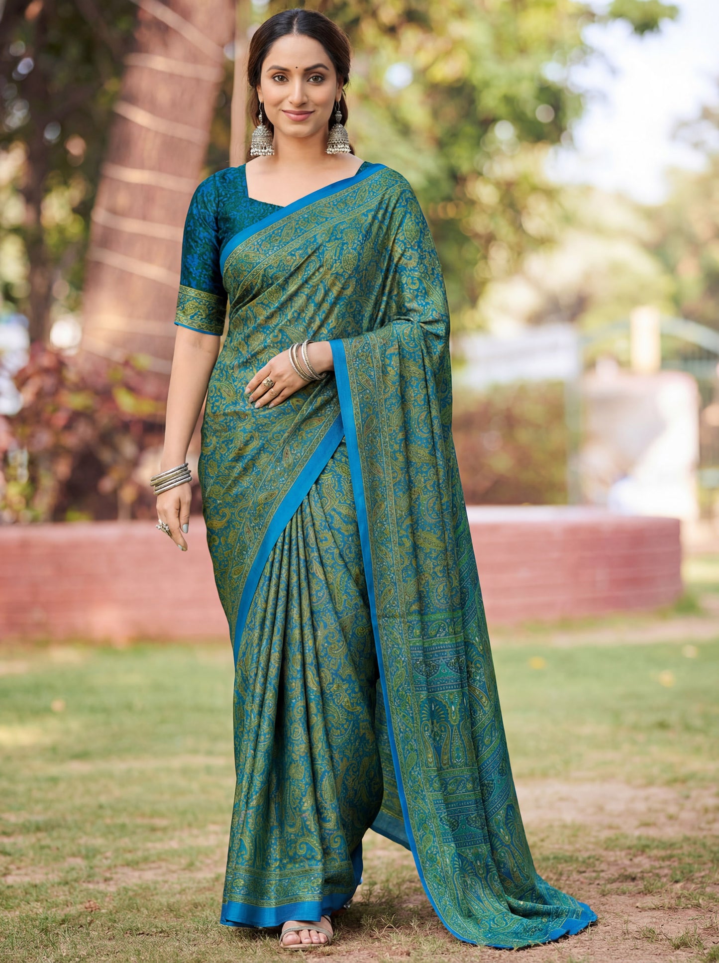 Rajkala - Teal Printed Crepe Silk Saree
