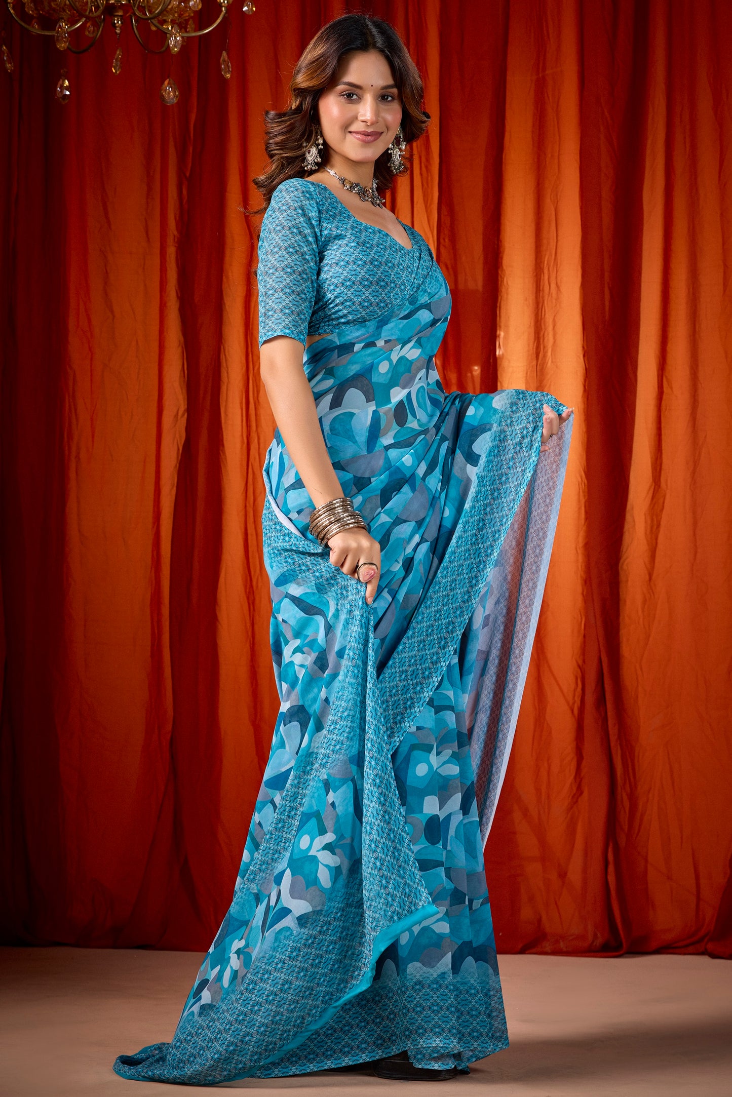 Shraddha - Firozi Georgette Digital Printed Saree